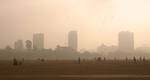 India Local Boys playing cricket on a foggy morning in Kolkata on Wednesday,21 January 2011 Thick fog across East India