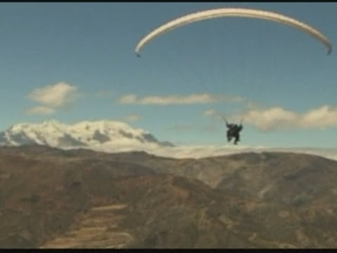 Paraglider crashes into moving van