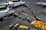 110722-N-BR887-022INDIAN OCEAN (July 22, 2011) Sailors move more than ten thousand pounds of mail delivered by two C-2A Greyhound aircraft assigned to Carrier Logistic Squadron (VA2) 115 aboard the aircraft carrier USS George Washington (CVN 73). George Washington is participating in Exercise Talisman Sabre 2011, a bilateral exercise intended to train Australian and U.S. Forces in planning and conducting combined task force operations. (U.S. Navy photo by Mass Communication Specialist 2nd Class