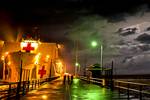 110807-N-NY820-066 - PUNTARENAS, Costa Rica - (Aug. 7, 2011) USNS Comfort (T-AH 20) is illuminated by lightning in Puntarenas, Costa Rica during Continuing Promise 2011 (CP11). CP11 is a five-month humanitarian assistance mission to the Caribbean, Central and South America. (U.S. Navy photo by Mass Communication Specialist 2nd Class Eric C. Tretter/RELEASED)