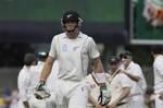 New Zealand batsman Martin Guptill leaves the field after being dismissed by Australia's Peter Siddle for 16 in their second test cricket match in Hobart, Australia, Saturday, Dec. 10, 2011.