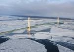 ST. IGNACE, Mich. - Ice forms in the Straits of Mackinac, underneath the Mackinac Bridge, Jan. 24, 2011. The Coast Guard's Research and Development Center, in New London, Conn., along with other agency partners, is testing and evaluating methods for removing spilled oil from an icy environment. U.S. Coast Guard photo by Petty Officer 3rd Class George Degener. (1505005) ( Oil in Ice project )