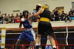 NEW LONDON, Conn. Third class cadet Gabe Nelson, a U.S. Coast Guard Academy boxer, fights in a bout during the U.S. Marine Corps Boxing Teams 6th Annual Northeast Tour Friday, Nov. 20, 2009 in Billard Hall at the Coast Guard Academy. The Coast Guard Academy hosted the event along with Heavy Hitters USA, a sports and mentoring program for at-risk youth, and presented an exhibition that featured the Marine Corps boxing team competing against boxers from the Coast Guard Academy, the United States N