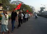 India Political Party CPI(M) Supporters on the rally during the General Strike called by Eleven Central Trade Unions against the anti people economic polices of the Union Goverment at Kolkata on Tuesday 28 February 2012 in Eastern India City