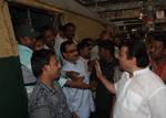 India West Bengal Transports Minister Madan Mitra meet the Train Passenger at Sealdha Station during the General Strike called by Eleven Central Trade Unions against the anti people economic polices of the Union Goverment at Kolkata on Tuesday 28 February 2012 in Eastern India City