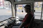 India West Bengal State Bus Driver wear Helmate during the General Strike called by Eleven Central Trade Unions against the anti people economic polices of the Union Goverment at Kolkata on Tuesday 28 February 2012 in Eastern India City