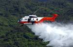 An AS332 helicopter from the Hong Kong Government Flying Service conducts a water bomb demonstration. A rotorcraft or rotary wing aircraft[1] is a heavier-than-air flying machine that uses lift generated by wings, called rotor blades, that revolve around a mast.