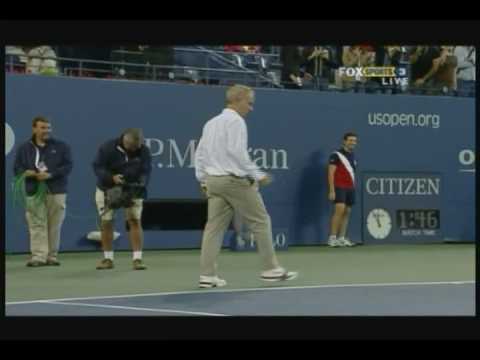 Novak Djokovic and John McEnroe having a hit