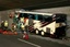 Rescuers and police work amid the wreckage of a tourist bus from Belgium at the accident site in a tunnel of the A9 highway near Sierre, western Switzerland, early Wednesday, March 14, 2012.