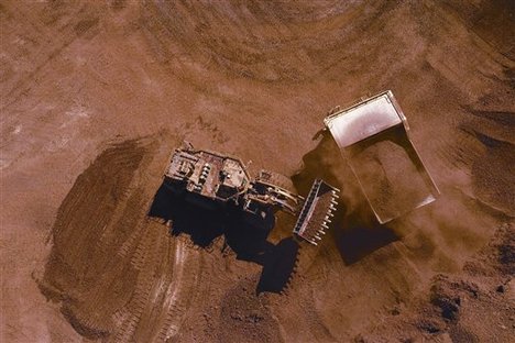 In this undated picture supplied by Rio Tinto, iron ore mining is seen in the Pibara region of Western Australia.