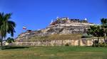 The Castillo San Felipe de Barajas is a fortress in the city of Cartagena, Colombia. The castle is located on the Hill of San Lázaro in a strategic location, dominating approaches to the city by land or sea.