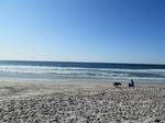 The beach on a sunny afternoon at Carmel-by-the-Sea. Carmel-by-the-Sea experiences a cool summer Mediterranean climate (Köppen climate classification Csb) typical of coastal areas of California.