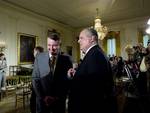 Conservative talk radio host Rush Limbaugh talks with Edward W. Gillespie, counselor to President George W. Bush and a former chaairman of the Republican National Committee, left, in the East Room of the White House in Washington, Tuesday, Jan. 13, 2009, as they arrived for the Presidential Medal of Freedom ceremony for Colombian President Alvaro Uribe, former British Prime Minister Tony Blair and former Australian Prime Minister John Howard. (AP Photo/J. Scott Applewhite)