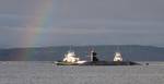 A rainbow appears off the bow of the Ohio-class ballistic-missile submarine USS Henry M. Jackson (SSBN 730) as it returns to Naval Base Kitsap-Bangor after a strategic deterrent patrol.