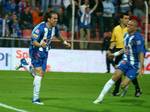 FC Porto´s soccer player Adriano celebrate after scoring against Penafiel during their Portuguese League soccer match at the 25 de Abril Stadium, Penafiel, northern Portugal, Saturday, April 22, 2006. Porto won 1-0 and clinched their 21st Portugue