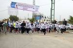 Participants compete in the UN-sponsored Gaza marathon in Beit Hanun in the northern Gaza Strip on March 1, 2012. Thousands of runners braved temperatures hovering just above zero degrees centigrade to take part in the impoverished Palestinian territory's second-ever marathon.