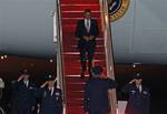 President Barack Obama walks down the stairs from Air Force One upon arrival to Andrews Air Force Base, Md., Saturday, March, 17, 2012.