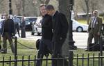 President Barack Obama and British Prime Minister David Cameron walk to Marine One on the Ellipse in Washington, Tuesday, March 13, 2012.