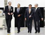 President Barack Obama tours the Rolls-Royce Crosspointe jet engine disc manufacturing facility, Friday, March, 9, 2012, in Prince George, Va. From left are, Plant Manager Lorin Sodell;the president; Rolls-Royce North America President & CEO James Guyette and Commerce Secretary John Bryson. Crosspoint facility manufactures precision-engineered engine disc and other components for aircrafts. (AP Photo/Pablo Martinez Monsivais)