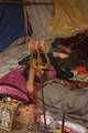 Indian Sadhu, or Hindu holy rest at a temporary camp at Babughat in Kolkata on 05 Jan 2012. Thousands of Hindu pilgrims taka holy dip at Gangasagar, hoping to wash away sins and others to secure a fine spouse, in a sun-worshipping tradition older than Hinduism itself in Eastern India City