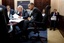 President Barack Obama and Vice President Joe Biden meet with members of the national security team regarding Afghanistan and Pakistan, in the Situation Room of the White House, Feb. 8, 2012.