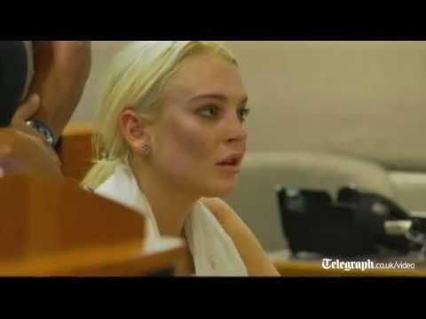 Lindsay Lohan leaves court in handcuffs