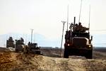 A motorized convoy from 2nd Battalion, 4th Marines clears through a route during Operation Alekhineâ€™s Gun, Feb 9. The operation found numerous weapons caches and an estimated 150 pounds of black tar heroin. Marines made use of their mobilized speed and night vision capability to disrupt and confuse enemy operations in the city of Shah Karez.