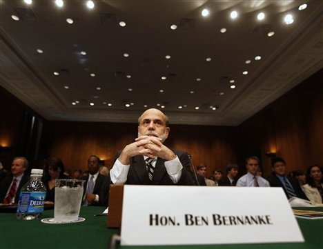 Federal Reserve Chairman Ben Bernanke testifies on Capitol Hill in Washington, Wednesday, July 22, 2009, before the Senate Banking Committee hearing on the semi-annual monetary policy report