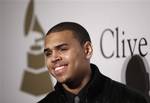 Chris Brown arrives at the Clive Davis pre-Grammy party in Beverly Hills, Calif. on Saturday, Feb. 7, 2009. (AP Photo/) Use Information: This content is intended for editorial use only. For other uses, additional clearances may be required.