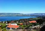 The Sea of Galilee, seen from Kinneret, Israel. The Jordan River runs along the Jordan Rift Valley, from Mount Hermon through the Hulah Valley and the Sea of Galilee to the Dead Sea, the lowest point on the surface of the Earth.