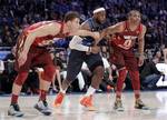 Western Conference Russell Westbrook (0), of the Oklahoma City Thunder and Blake Griffin (32), of the Los Angeles Clippers defend Eastern Conference's LeBron James (6), of the Miami Heat, during the second half of the NBA All-Star basketball game, Sunday, Feb. 26, 2012 in Orlando, Fla. (AP Photo/Chris O'Meara)