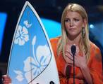 Singer Britney Spears accepts her award for Choice Female Artist at the Teen Choice Awards in Los Angeles, Sunday, Aug. 4, 2002.