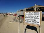 A version of the Checkpoint Charlie sign at Burning Man 2011. Steven Van Zandt (E Street band/Bruce Springsteen) has a song titled 