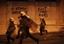 Riot Policemen chase protesters in front of a hotel during a protest in Athens, Wednesday April 4 2012. The graffiti reads "The Nation Murders".