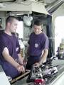 Arabian Gulf (July 15)--SA Christopher M. Farr (right) breaks in SA Gregg J. Lavasseur on the duties of helmwatch on the bridge of the CGC Midgett (WHEC 721). The U.S. Coast Guard Cutter Midgett departed homeport of Seattle Washington on June 18, 1999, to deploy with the USS Constellation Battle Group to the Persian Gulf. The Midgett is the first Coast Guard cutter to deploy to the Gulf with a U.S. Navy Battle Group. Once in the Gulf, the Midgetts primary missionis to enforce the United Nation's