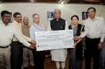 The Union Minister for Coal, Shri Sriprakash Jaiswal being presented a dividend cheque for 2011-12 by the Coal India Limited (CIL), in New Delhi on March 23, 2012.