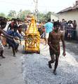 A Hindu devotee walk on the burning Coal during the Shiva Gajan festival in the village , Hundreds of faithful devotees offer such sacrifices each year in hope of winning the favour of Hindu god Shiva and ensuring the fulfilment of their wishes in Eastern India City