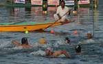 Kashmiri muslim boys play water polo after the inagural function of 