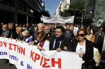 Media workers protest in central Athens, on Tuesday, Oct. 18, 2011. Greek railway workers and journalists joined ferry crews, garbage collectors, tax officials and lawyers on Tuesday in a strike blitz against yet more austerity measures required if the country is to avoid defaulting on its debts.