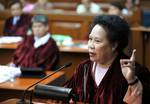 Philippine Senator Miriam Santiago gestures as she speaks during an impeachment trial of Supreme Court Chief Justice Renato Corona (not pictured) on the fifth day of the trial at the Philippine Senate in Manila, Philippines, Tuesday, Jan. 24, 2012. The Philippines' first impeachment trial of a Supreme Court justice started on Jan. 16, in a major battle of President Benigno Aquino III's anti-corruption campaign targeting his detained predecessor and her allies. Corona was impeached by the House o