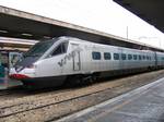 ETR 480 in Roma Termini railway station. In 1982, FIAT acquired patents for the tilting bogie used in the ill-fated British project APT.