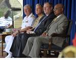 Adm. Gary Roughead, left, Gen. James F. Amos, Undersecretary of the Navy Robert O. Work and BJ Penn attend the Department of the Navy tribute to African American Leadership at the Pentagon.