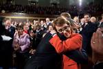 President Barack Obama hugs Rep. Gabrielle Giffords, D-Ariz., on the floor of the House Chamber at the U.S. Capitol in Washington, D.C., before delivering the State of the Union address, Jan. 24, 2012. (Official White House Photo by Pete Souza)This official White House photograph is being made available only for publication by news organizations and/or for personal use printing by the subject(s) of the photograph. The photograph may not be manipulated in any way and may not be used in commercial