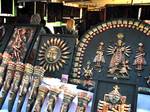 Artisans seen preparing different handicraft articles at the State level Jungle mahal handicraft exhibition at the Midnapore college ground in Midnapore town in Eastern India