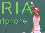 Shaui Zhang of China competes against Elena Baltacha of Great Britain during the Day 2 of qualifying rounds of the Sony Ericsson Open at Crandon Park Tennis Center on March 20, 2012 in Key Biscayne, Florida - USA.