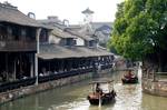 Wuzhen town, a prefecture-level city in northern Zhejiang province. Lying on the Grand Canal of China, Jiaxing borders Hangzhou to the southwest, Huzhou to the west, Shanghai to the northeast, and the province of Jiangsu to the north.