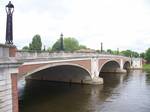 Hampton Court Bridge, London. Photograph taken in a public location in the UK of a building on permanent public display, and exempt from copyright under Section 62 of the Copyright Designs & Patents Act 1988 (