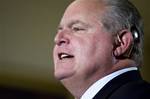 Conservative talk radio host Rush Limbaugh attends a ceremony in the East Room of the White House in Washington, Tuesday, Jan. 13, 2009. President Bush was presenting the Presidential Medal of Freedom to Colombian President Alvaro Uribe, former British Prime Minister Tony Blair and former Australian Prime Minister John Howard. Limbaugh, who suffered hearing loss as a result of auto-immune inner ear disease, wears a cochlear implant, a powerful hearing aid that is implanted in the inner ear of an