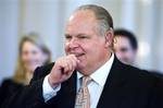 Conservative talk radio host Rush Limbaugh attends a ceremony in the East Room of the White House in Washington, Tuesday, Jan. 13, 2009. President Bush was presenting the Presidential Medal of Freedom to Colombian President Alvaro Uribe, former British Prime Minister Tony Blair and former Australian Prime Minister John Howard. Limbaugh, who suffered hearing loss as a result of autoimmune inner ear disease, wears a cochlear implant, a powerful hearing aid that is implanted in the inner ear of an