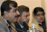 Prime Minister Syed Yousaf Raza Gilani, left, Hameed Ullah Jan Afridi, Environment Minister of Pakistan, center, and Hena Robbani Khar, right, Economic Affairs assistant for Prime Minister, at press conference at the World Economic Forum on the Middle East, in Sharm El-Sheikh, Egypt, Monday, May 19, 2008. Pakistan's premier has pledged to fight terrorism after a meeting with President Bush _ the highest-level contact between the two governments since Pakistan's new leaders offered peace talks to